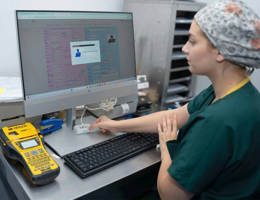 An embryologist at SAGA Clinic labelling samples at the electronic witness system